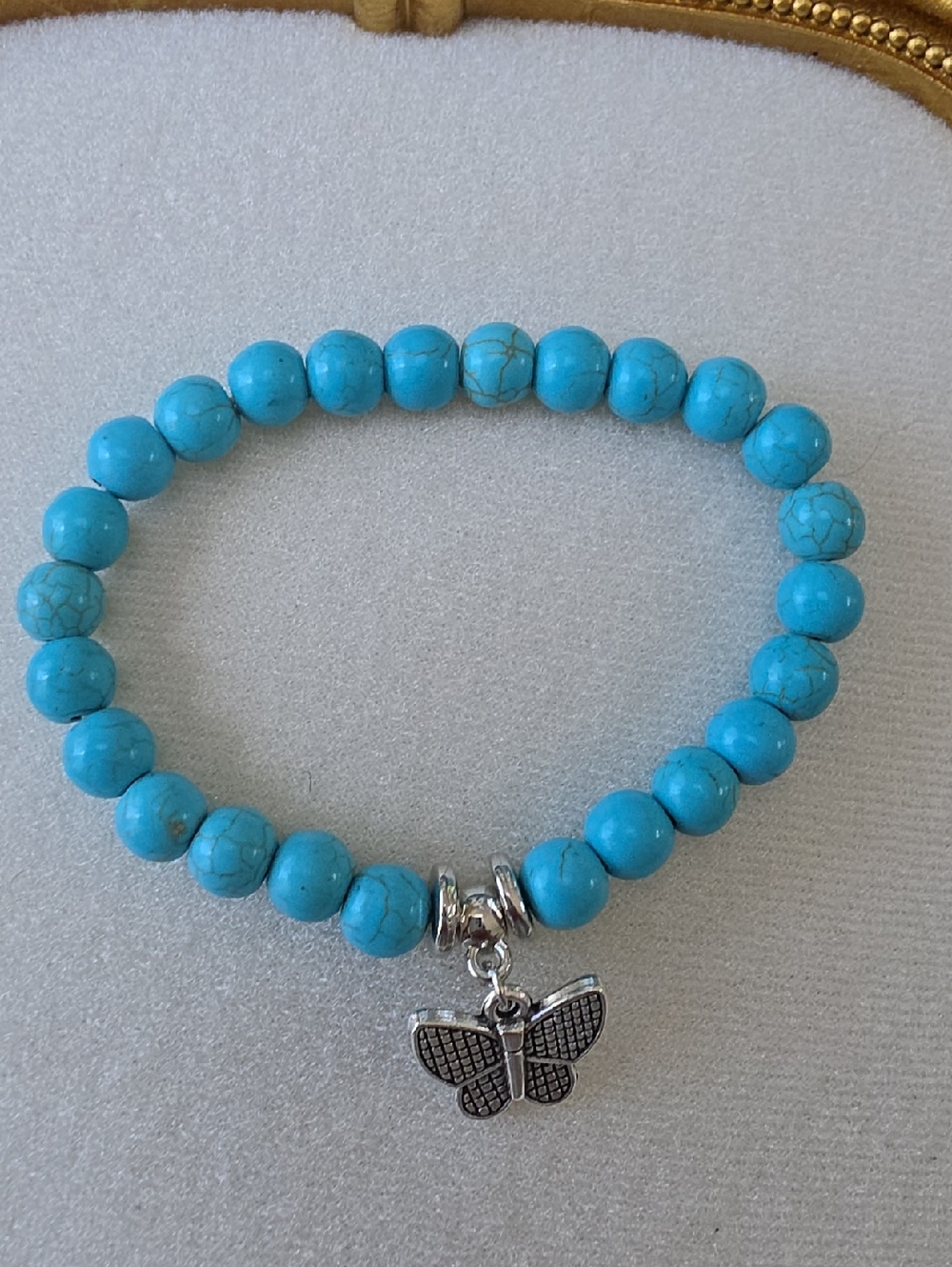 Turquoise Beaded Bracelet with Butterfly Charm